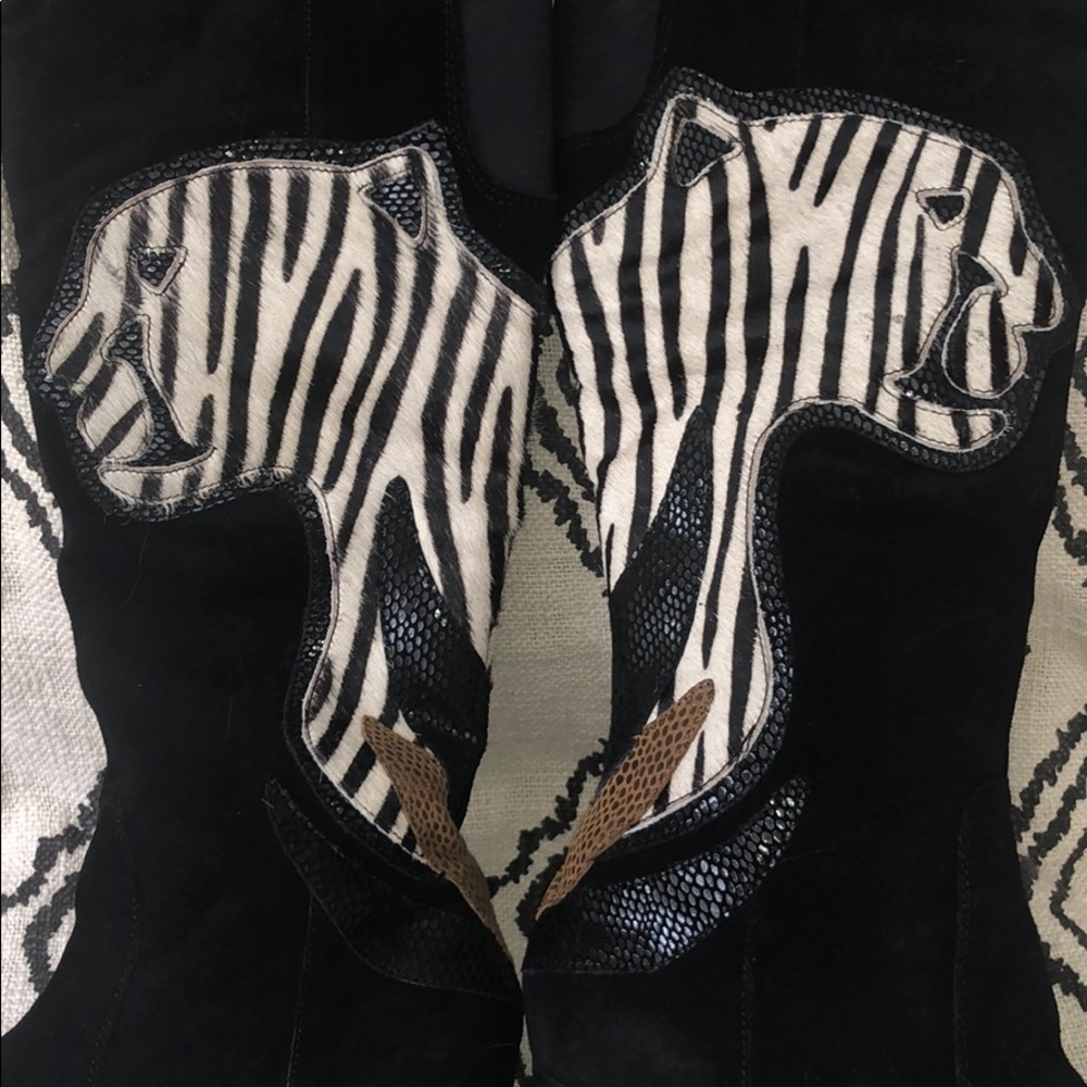 Tall black suede boots with animal appliqué